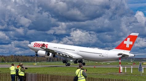 SWISS Airbus A340-300 departing Zurich Airport on a long-haul flight
