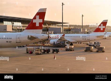 SWISS aircraft fleet parked at Zurich Airport terminal