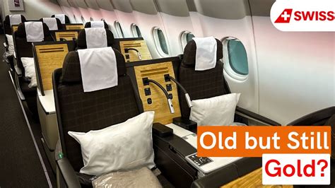 swiss international air lines business class with alpine window view