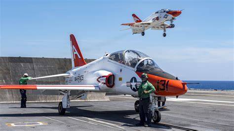 T-45C Goshawk naval jet trainer launching from a US Navy aircraft carrier