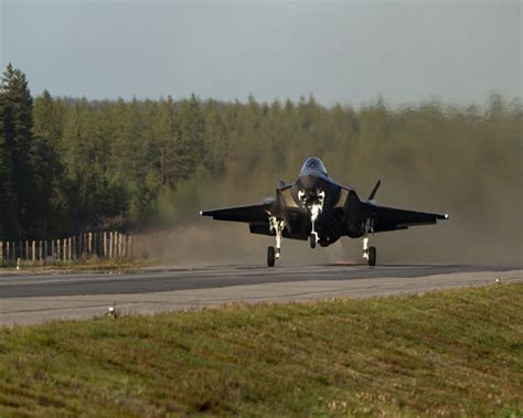 Tail-mounted drag chute on Norwegian F-35A operating on icy runway