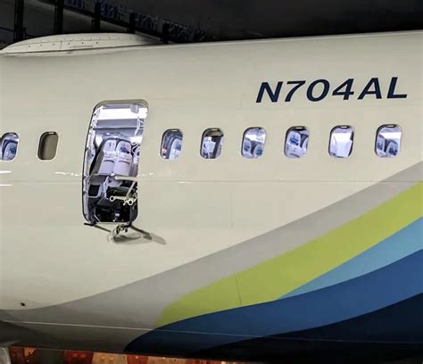 tail of N704AL showing AL registration suffix