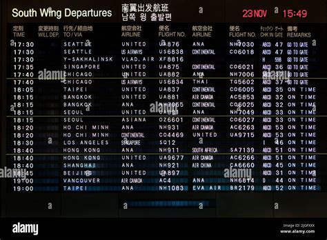 taipei taoyuan airport departure board showing china airlines flight to los angeles