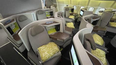 TAP Air Portugal A330-900neo business class cabin modern lie-flat seats Lisbon route