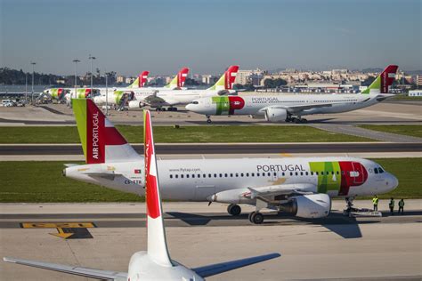 tap air portugal aircraft at porto airport with passengers boarding