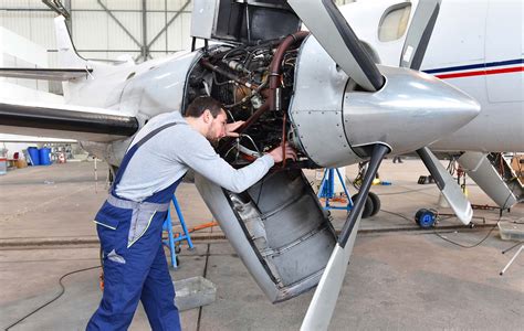Technician at Able Aerospace Services meticulously working on a complex aircraft component repair