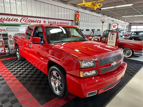technician inspecting chevrolet silverado ss transmission system