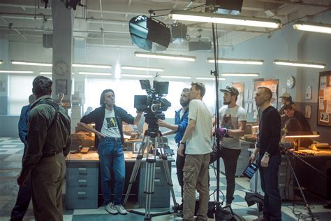 Television production crew filming inside an airport terminal, similar to ILM