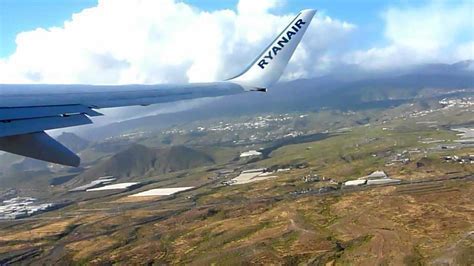 Tenerife South Ryanair MAX departure at dusk over volcanic terrain