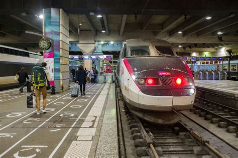 TGV train arriving at Moûtiers station in winter