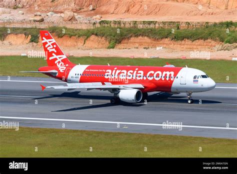 Thai AirAsia aircraft at Phnom Penh International Airport during peak hours