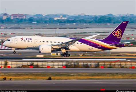 Thai Airways Boeing 787-8 in flight with purple and gold livery