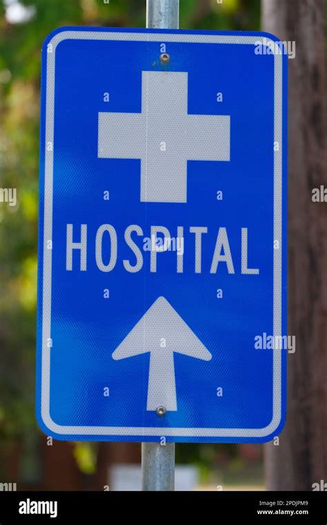 Thai hospital sign with international symbols near tourist area