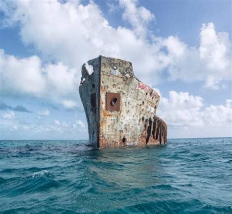 The remains of SS Sapona emerging from the shallows near Bimini Island