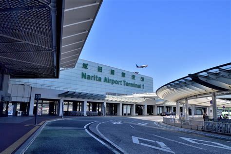 Tokyo Narita Airport international terminal with American Airlines aircraft