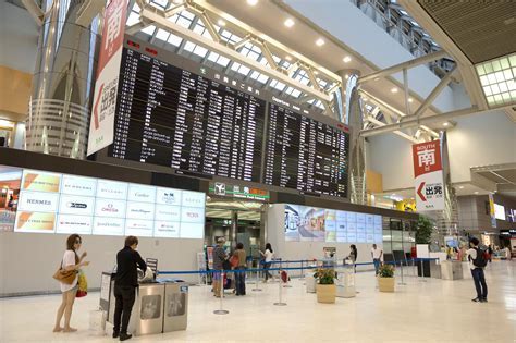 tokyo narita airport international terminal with lot polish and eva air signage