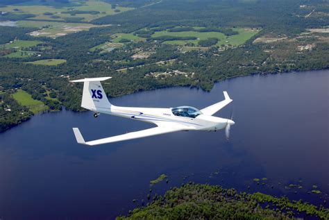 touring motor glider in flight