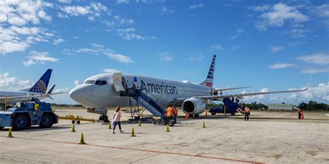Tourists arriving at Philip S.W. Goldson International Airport in Belize City from Air Canada Rouge’s inaugural Montreal flight