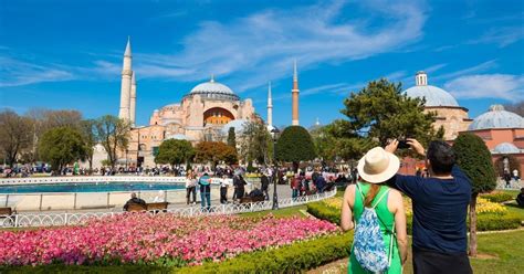 Tourists enjoying Hagia Sophia in Istanbul amidst updated travel safety protocols
