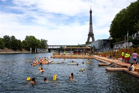 Tourists swim in the Seine River amid Paris heatwave