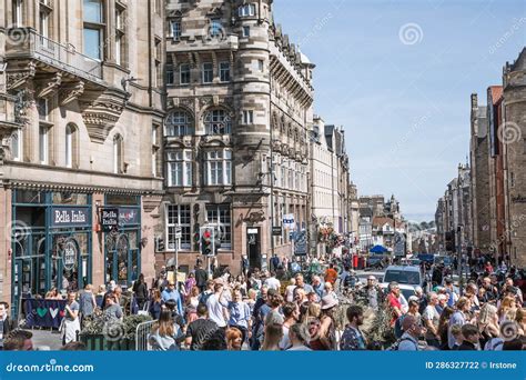 Tourists walking along Edinburgh’s Royal Mile during festival season