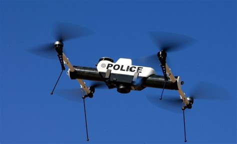 traffic surveillance drone observing vehicles at night