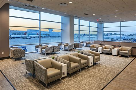 traveler resting in airport lounge early in morning after overnight arrival