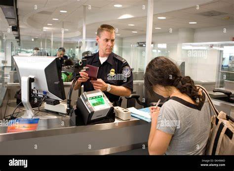 Travelers crossing ASEAN border checkpoint with visa-free documentation