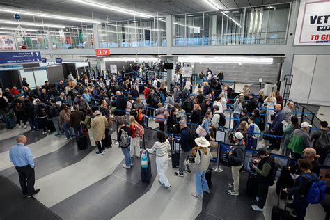 travelers stranded at gate amid delays during US summer weather disruptions