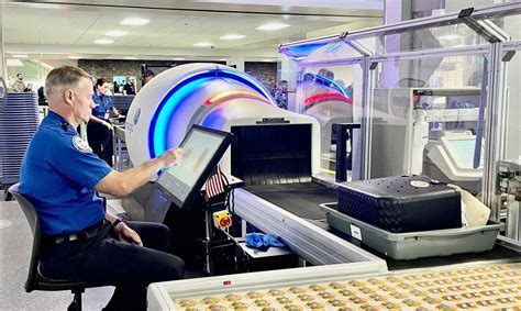 TSA officer analyzing suspicious scan for drug trafficking, 2024