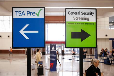 tsa precheck signage at airport terminal entrance