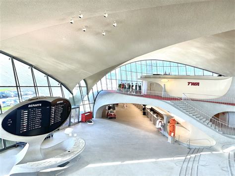 TWA Hotel interior with iconic red lounge and Jet Age architecture