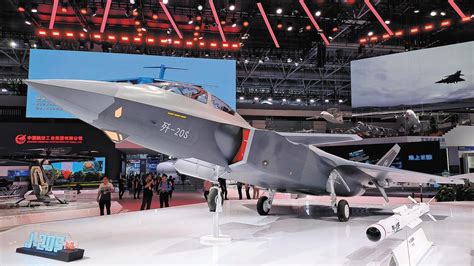 twin-seat J-20S taxiing at Chengdu facility with canopy open