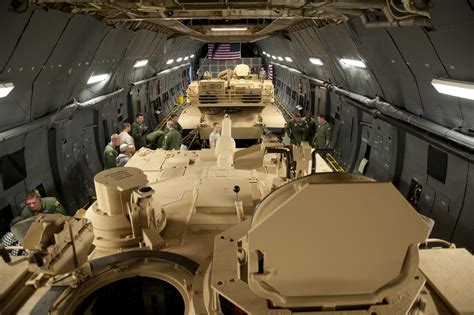 Two M1A2 Abrams tanks inside C-5M Super Galaxy cargo compartment