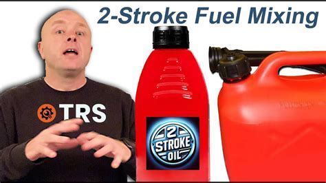 two-stroke fuel mixture with visible blue tint in transparent container