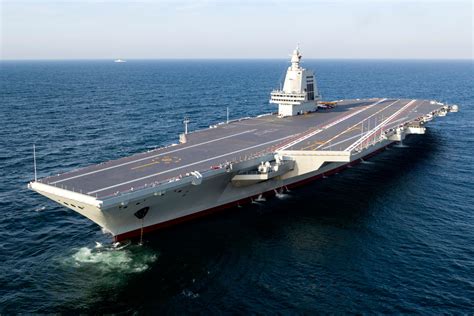Type 003 aircraft carrier Fujian undergoing sea trials with deck modifications for stealth fighters