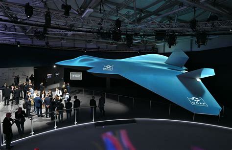 Typhoon jet flying alongside concept art of GCAP 6th-gen fighter