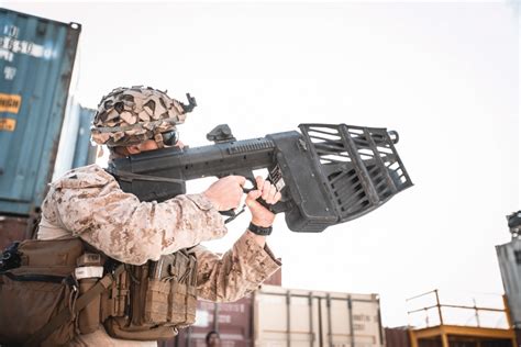 U.S. Air Force operator aiming Dronebuster counter-UAS system