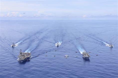 U.S. Navy and allied forces coordinate joint flight operations in Indo-Pacific