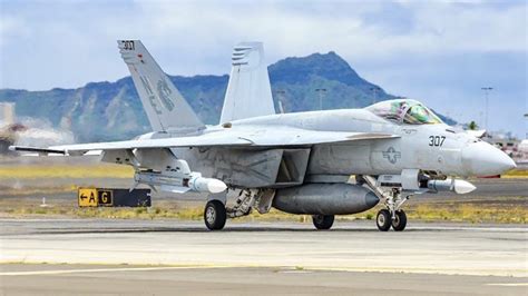 U.S. Navy Super Hornet patrolling over the Red Sea with updated air-to-air missile loadout