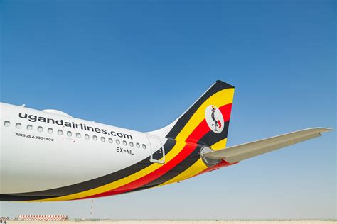 Uganda Airlines staff at check-in desks during crisis period