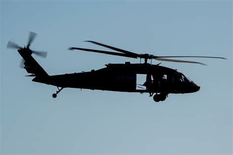 uh-60 black hawk flying over swiss alps in aerofly fs 4