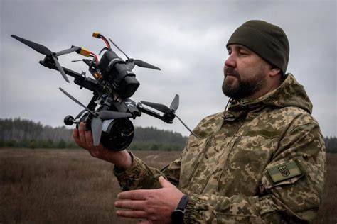 Ukrainian drone engineers assembling fibre optic UAVs