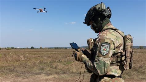Ukrainian drone operator reviewing telemetry during real-time battlefield mission