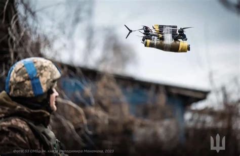 Ukrainian soldiers launch commercial drones during a defensive operation in Kharkiv region