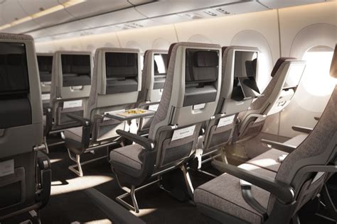 ultra long haul flight cabin night scene passengers sleeping across seats airline interior