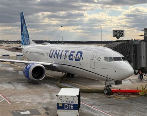united 737 max 8 at gate preparing for flight to nuuk greenland