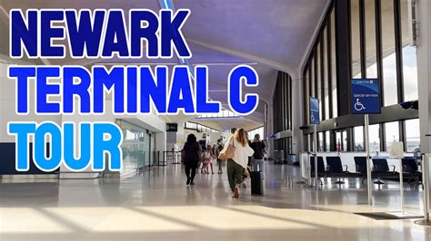 united airlines aircraft boarding at newark terminal c for dominica flight