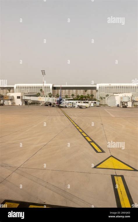 united airlines at marrakech menara airport with atlas mountains in view