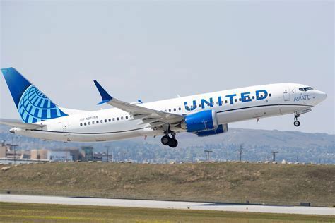 United Airlines Boeing 737 Max 8 taking off from Madeira for its return flight to New York
